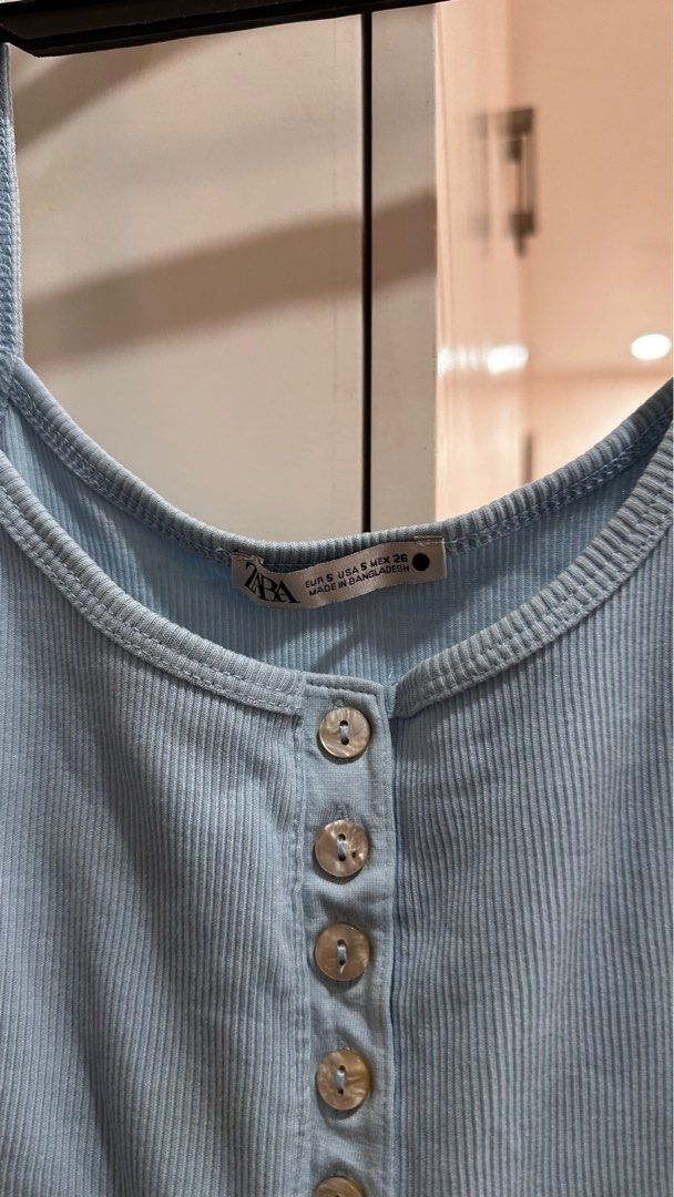 Zara Blue Ribbed sleeveless Crop top (Category: Shirts) located in Manila. Submitted by zlook (Listing ID 1274202723, Image 2). Description: Size S but can fit medium size girlies cuz Im one.