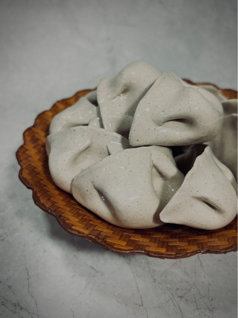 Ceramic Dumpling (Category: Handmade Craft) located in Singapore. Submitted by luclay (Listing ID 1274584471, Image 3). Description: Handmade ceramic dumplings. Fired at 1200 degC. Coated with transparent glaze. Made with light speckled stoneware clay. Hollow inside. Maximum 7 pieces per order. Bamboo plate not included. .
