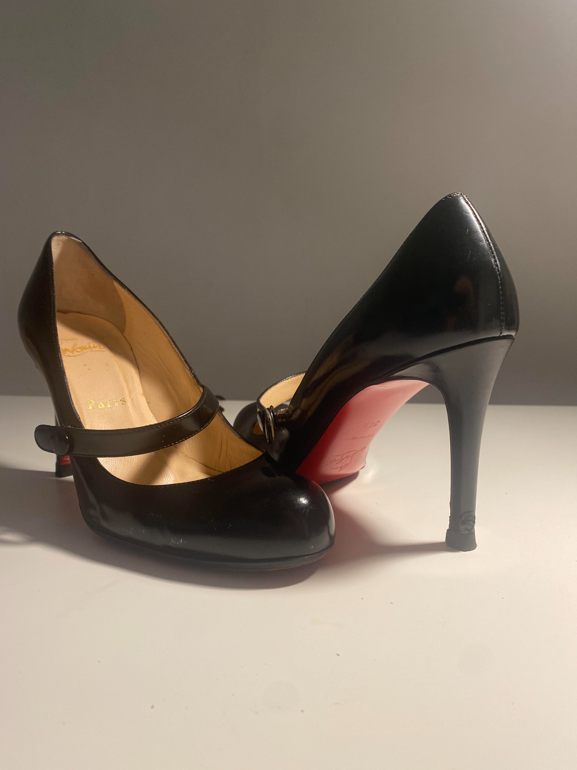 Classic Louboutin black leather Booton Mary Jane pumps Luxury