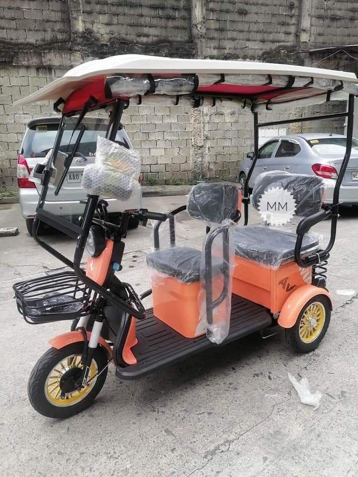 ETRIKE AVIA CRUISER (Category: Bicycles) located in Manila. Submitted by minidivisoria (Listing ID 1274567303, Image 3). Description: AVIA CRUISE ETRIKE 😱 New fashion colour Automatic wiper Removable battery charge sa loob ng bahay Handbrake pwede parada sa pataas Motor 1000w Original Meron din Fan kahit ilan tao Sakay kaya 3 wheels,2 rows with ROOF! INCLUSIONS: ✅Unit with complete accessories 👍Kasama bobong 👍kasama trapal 👍Kasama Wiper 👍Kas