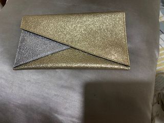 Gold and silver clutch bag