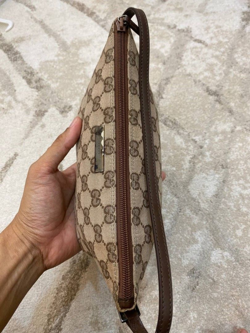 Gucci wristlet pouch online
