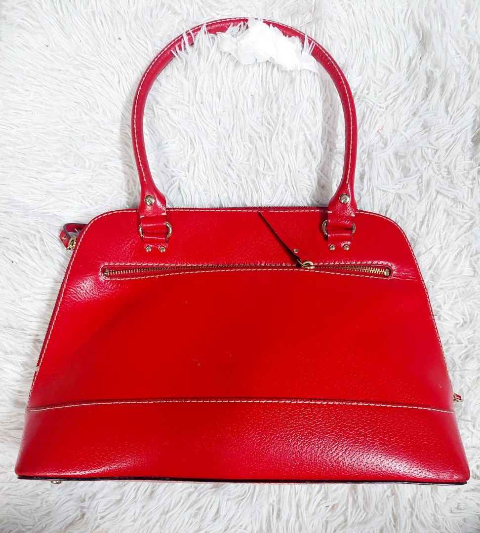 Kate Spade Red Bag (Category: Luxury Bags & Wallets) located in Mandaluyong City. Submitted by kayeson (Listing ID 1274563907, Image 3). Description: Kate Spade Red Bag Rarely used sign of usage but unnoticeable very nice RFS: Not using anymore.