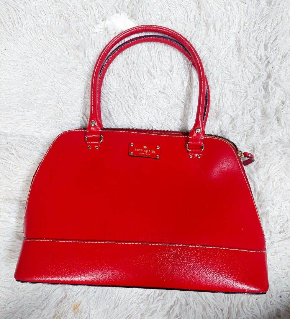 Kate Spade Red Bag (Category: Luxury Bags & Wallets) located in Mandaluyong City. Submitted by kayeson (Listing ID 1274563907, Image 1). Description: Kate Spade Red Bag Rarely used sign of usage but unnoticeable very nice RFS: Not using anymore.