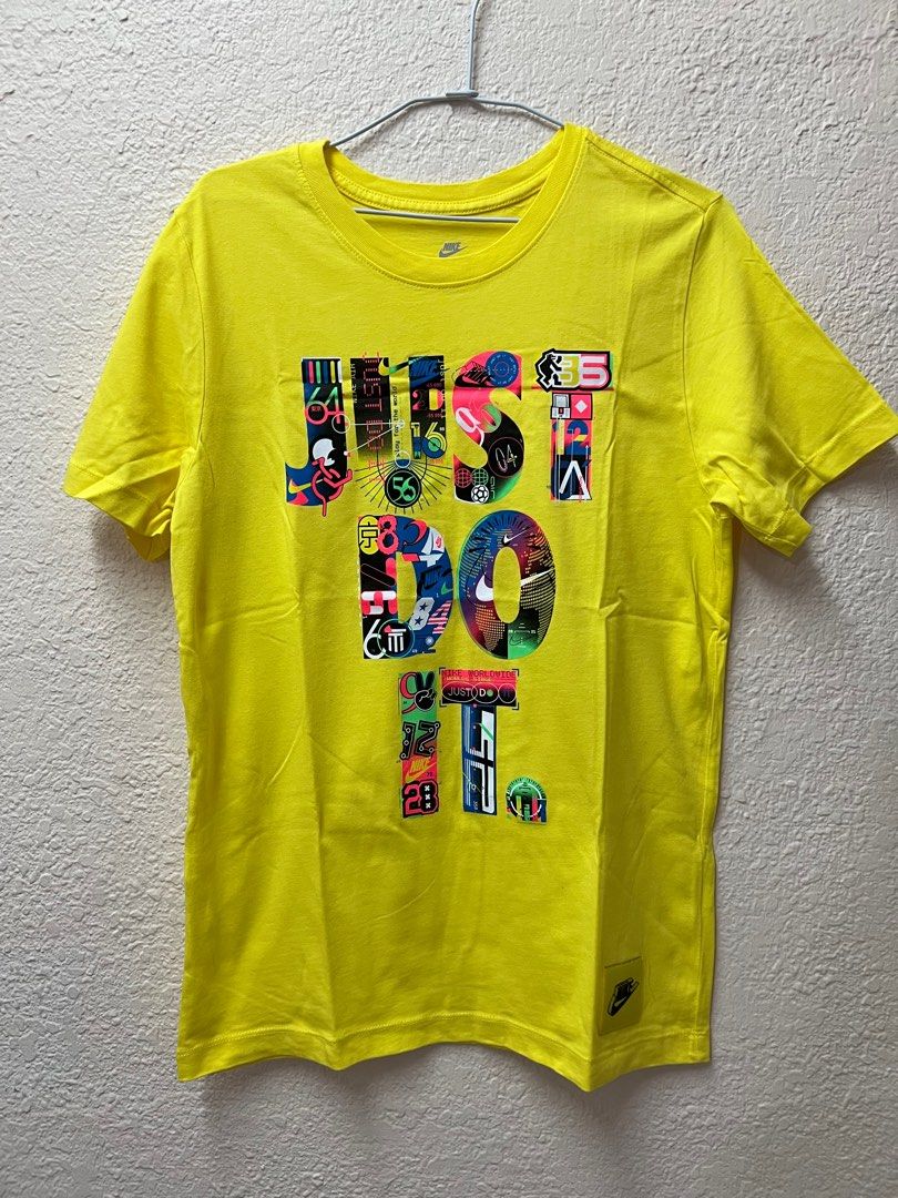 White and yellow nike shirt store
