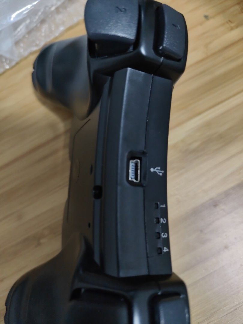 Playstation-compatible Controller (Category: Controllers) located in Singapore. Submitted by letsgoonwheels (Listing ID 1274542077, Image 2). Description: brand new. no brand. only controller. no charging cable..