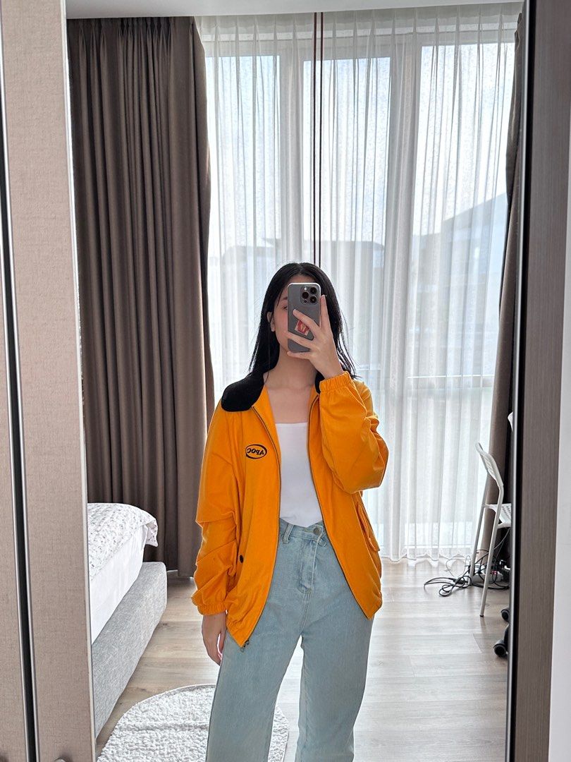 A piece of 2024 cake clothing yellow jacket