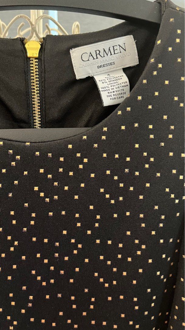 Carmen Marc Volvo black dress (Category: Dresses) located in Pasig City. Submitted by bituin18 (Listing ID 1274637270, Image 2). Description: Carmen Marc Valvo dress. Black with gold details. Used once only. Bought for 5k. Selling for 1900. Size 4. .