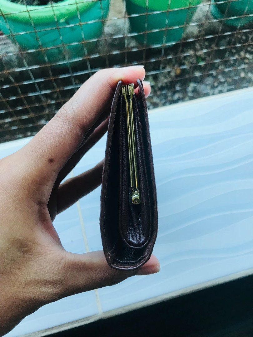 Croc skin kiss lock medium wallet (Category: Luxury Bags & Wallets) located in Santa Maria. Submitted by mikavillaflor4 (Listing ID 1274947808, Image 2). Description: In good condition Legit croc skin.