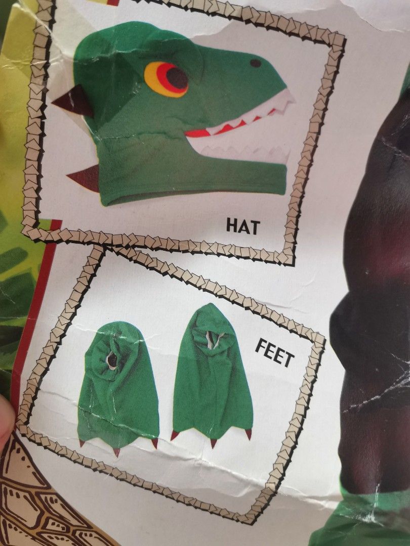 Dinosaur Costume (Category: Babies & Kids Fashion) located in Pasig City. Submitted by dehoarding (Listing ID 1274698958, Image 3). Description: Used condition See pics Fits 3-7yo approx See last pic. One tie on the waist has been pulled, mendable.