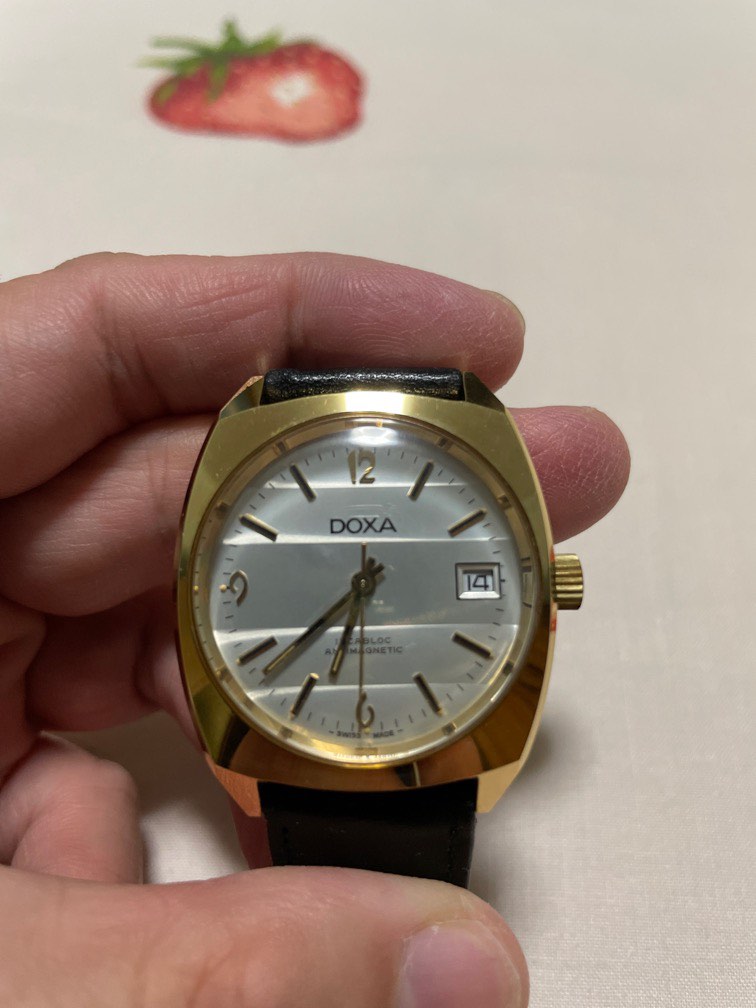Doxa gold cheap watch 18k