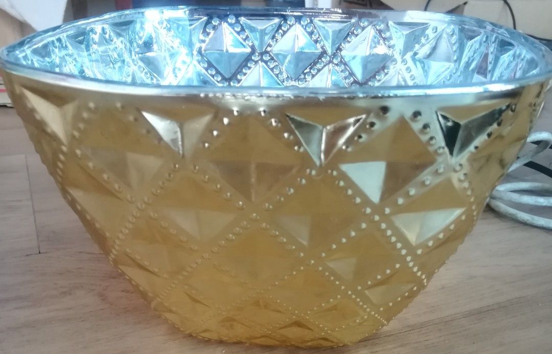 Glass Cased Bowl Quilted Design (Category: Food Organization & Storage) located in Manila. Submitted by groovy.groovy (Listing ID 1274714647, Image 2). Description: Dimpled design two toned color, Gold exterior with silver interior color 8 x 8 inch Base - 5 inch Fruit and food storage glass case bowl Not microwavable..