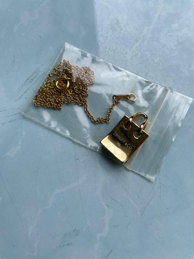 Gold plated shop charm necklace