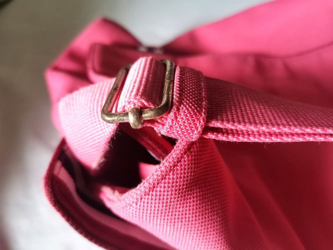 Lacoste Cross Body Bag (Category: Luxury Bags & Wallets) located in Pasig City. Submitted by dehoarding (Listing ID 1274705092, Image 2). Description: In good used condition Authentic Machine washable See picture (flaw on the last photo) Price further reduced.