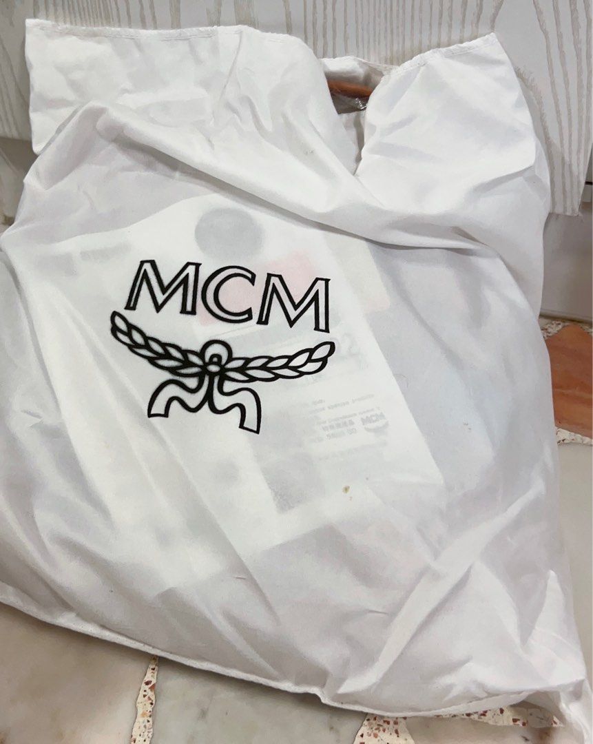Mcm backpack dust best sale bag