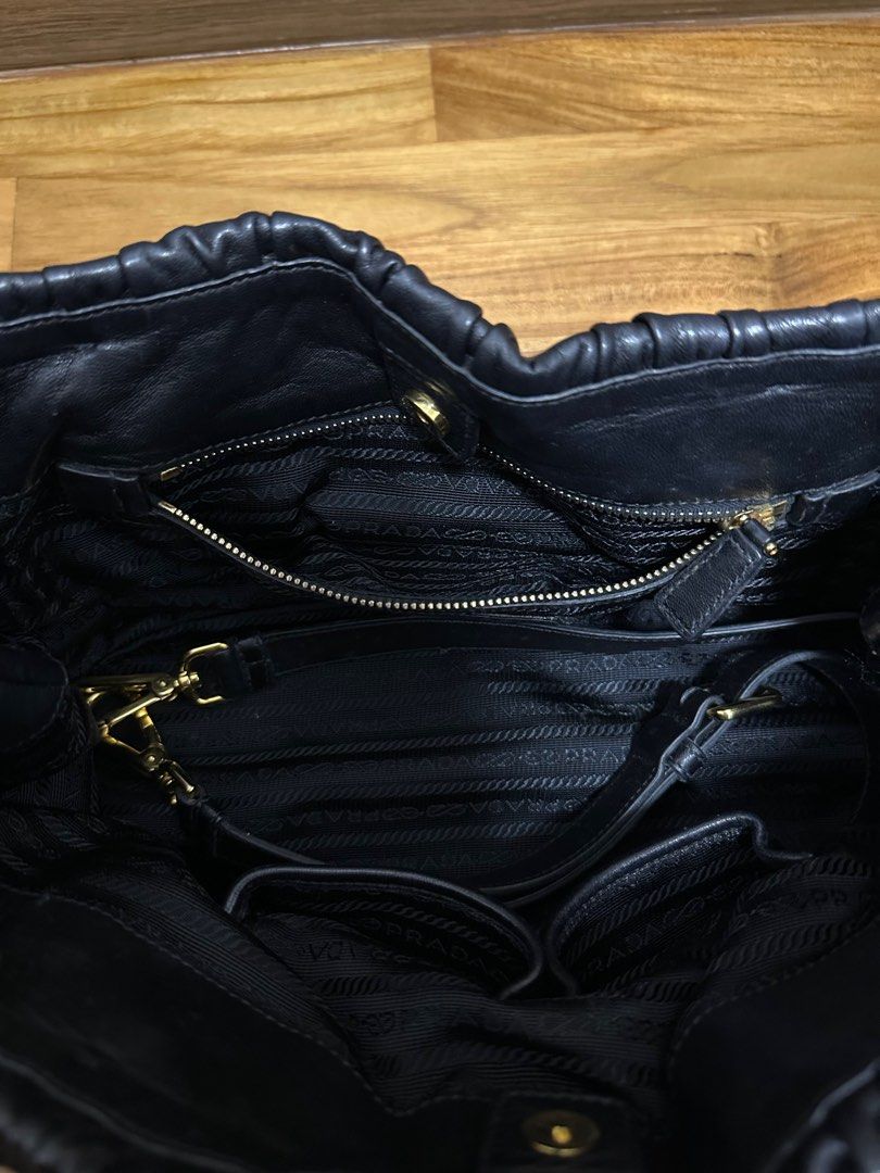 Prada Black Classic Quilted Leather Nappa Gaufre Nero Tu (Category: Bags & Wallets) located in Singapore. Submitted by lilhype (Listing ID 1274825530, Image 3). Description: rarely used in good condition stored in a temperature controlled environment taken out to air regularly my loss, your gain comes with receipt extra strap to be used as a crossbody bag original prada bag filler.
