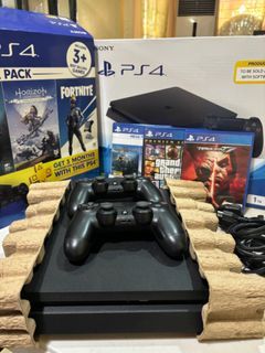 PS4 Slim (1TB) with box and 2 controllers