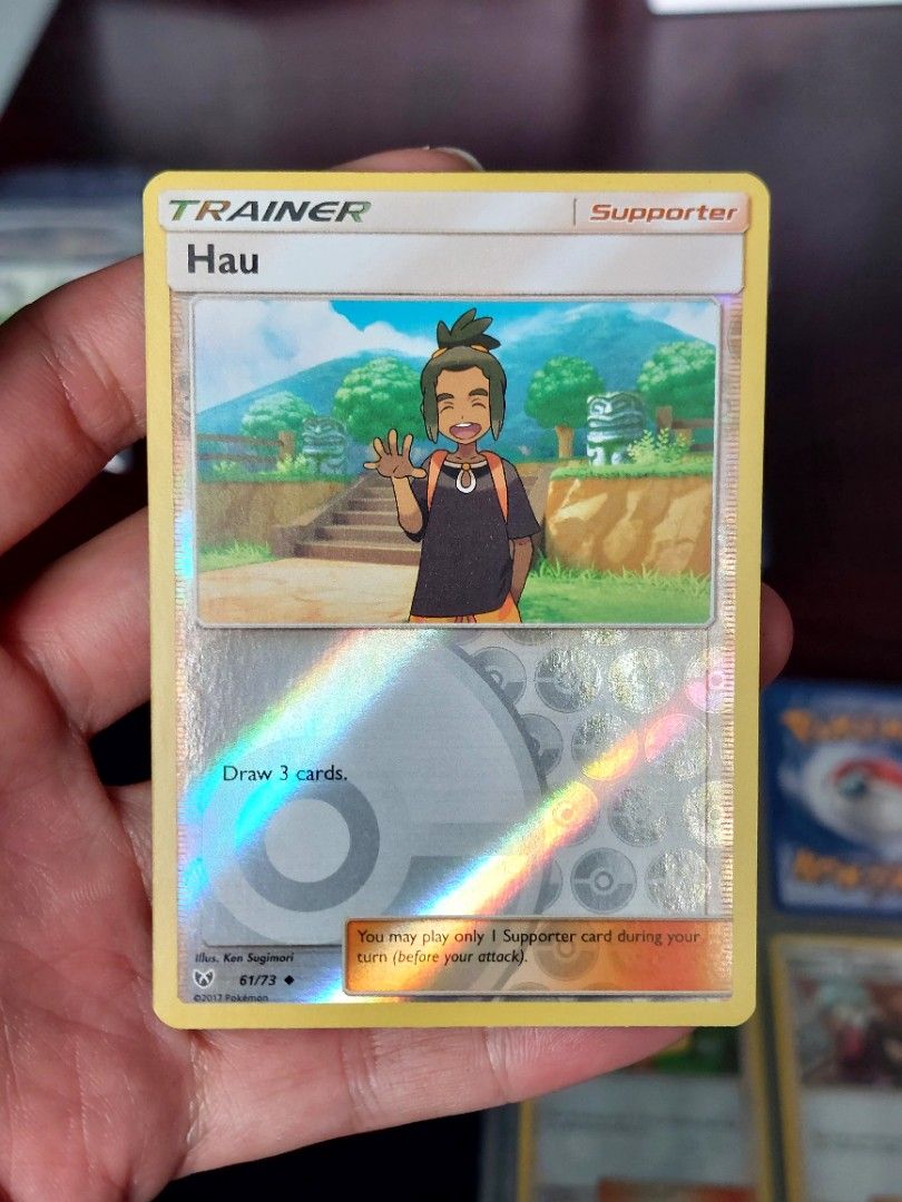 2017 Pokemon TCG Sun And Moon Shining Legends Hau Reverse Holo Trainer Card,  Hobbies & Toys, Toys & Games on Carousell