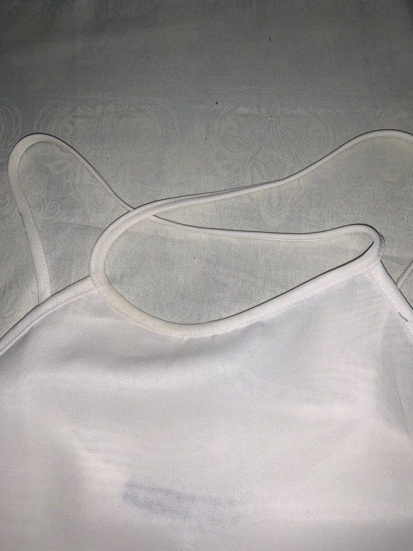 Backless top (Category: Blouses) located in Talisay. Submitted by bilchecomedia (Listing ID 1274970775, Image 2). Description: Has a few discolorations but can definitely be cleaned. Used a few times. Can fit s-m.
