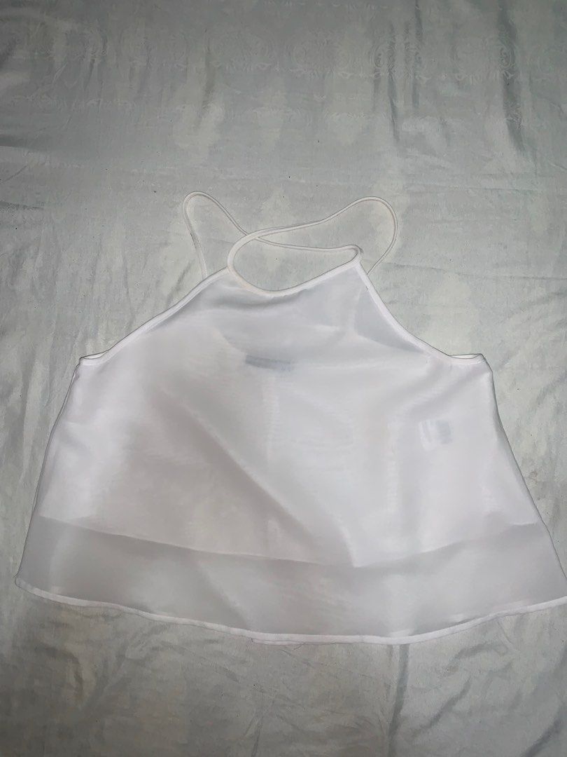 Backless top (Category: Blouses) located in Talisay. Submitted by bilchecomedia (Listing ID 1274970775, Image 1). Description: Has a few discolorations but can definitely be cleaned. Used a few times. Can fit s-m.