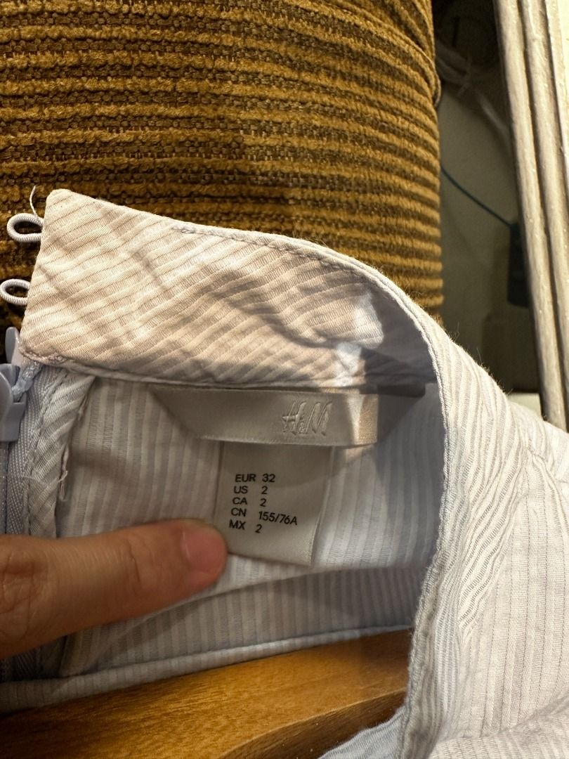 H&M Light Blue & White Striped, Bell-sleeved Top (Category: Blouses) located in San Juan City. Submitted by k.archive (Listing ID 1274977948, Image 3). Description: H&M Light Blue & White Stripe Bell-sleeved Top Color/Print: Light Blue and White Stripes Material: Cotton Sleeves are slightly oversized and bell shaped Size: see photos for exact size Can fit Small to Medium Built Frame Message for more inquiry Reason for Selling: Decluttering.