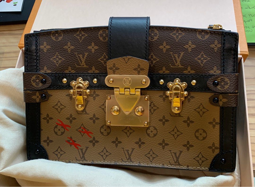 Louis vuitton hotsell trunk clutch
