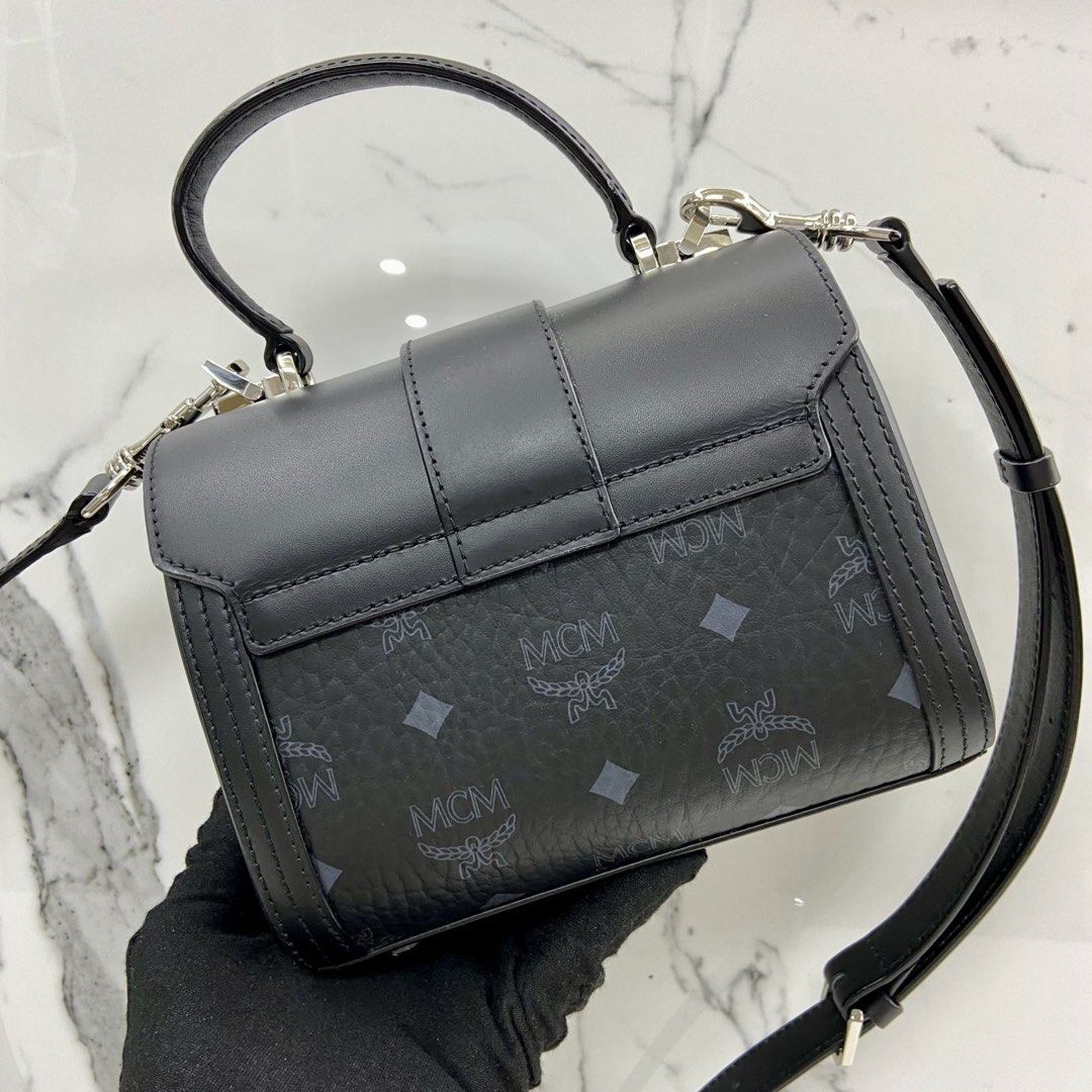 Mcm mini top best sale handle leather crossbody bag
