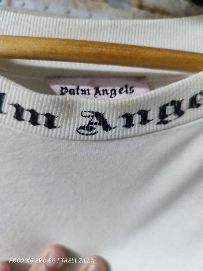 Palm Angels (Category: Tshirts & Polo Shirts ) located in Manila. Submitted by trellzilla666 (Listing ID 1275070023, Image 3). Description: 𝕻𝖆𝖑𝖒 𝕬𝖓𝖌𝖊𝖑𝖘 ₱750 + sf Excellent Condition Medium on tag but fits L-XXL (25x30-31) No issue naman pero need wash na lang para mukhang bago talaga Quezon City : Sm North/Munoz 📍 Rfs: nakatambak na lang di na nagagamit. Dm me..