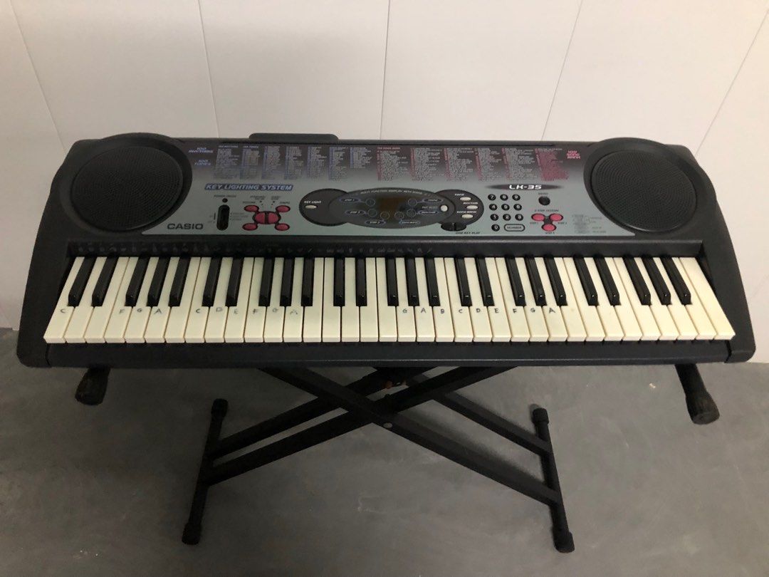 Well used Casio Keyboard with Stand for Sale Hobbies Toys
