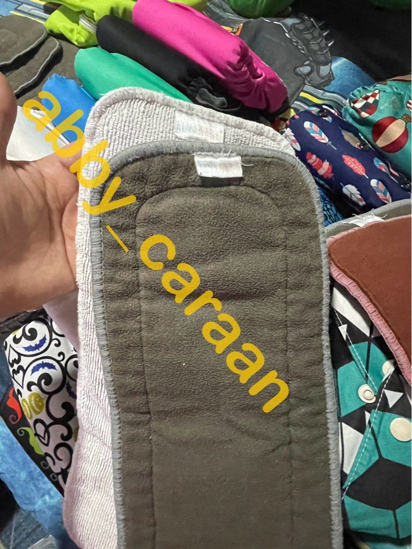 ALVA Cloth Diaper Bundle (Category: Diapers & Baby Wipes) located in Manila. Submitted by abigailcaraan (Listing ID 1269158857, Image 3). Description: Get all 29pcs ALVA cloth diapers (used for 2yrs all in good condition) + 63inserts (assorted bamboo charcoal, microfiber, coffee fiber) + 2 big wet bags SIZE: with 3x3 adjustable snaps to fit babies from 6.6lbs (newborn) up to 33 lbs (3-4yo) RFS: Decluttering, outgrown. MOP: Bank transfer PRICE IS 