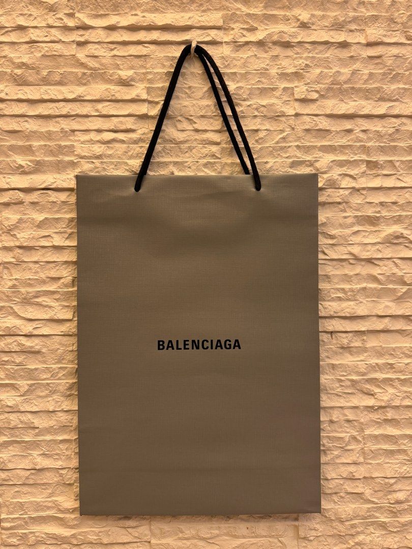 Balenciaga Paper Bag Large 2pcs (Category: Luxury Accessories) located in San Fernando. Submitted by mnlt_o (Listing ID 1269206845, Image 1). Description: Authentic From Balenciaga, Paris See photos for condition OAD: 45 L x 32 W x 12 D cm Price: 1,000 each take all for 1,500 shipping incl. Location: San Fdo Pamp..