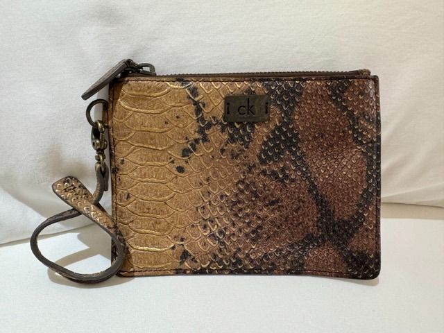 ck Calvin Klein Snake Print Wristlet