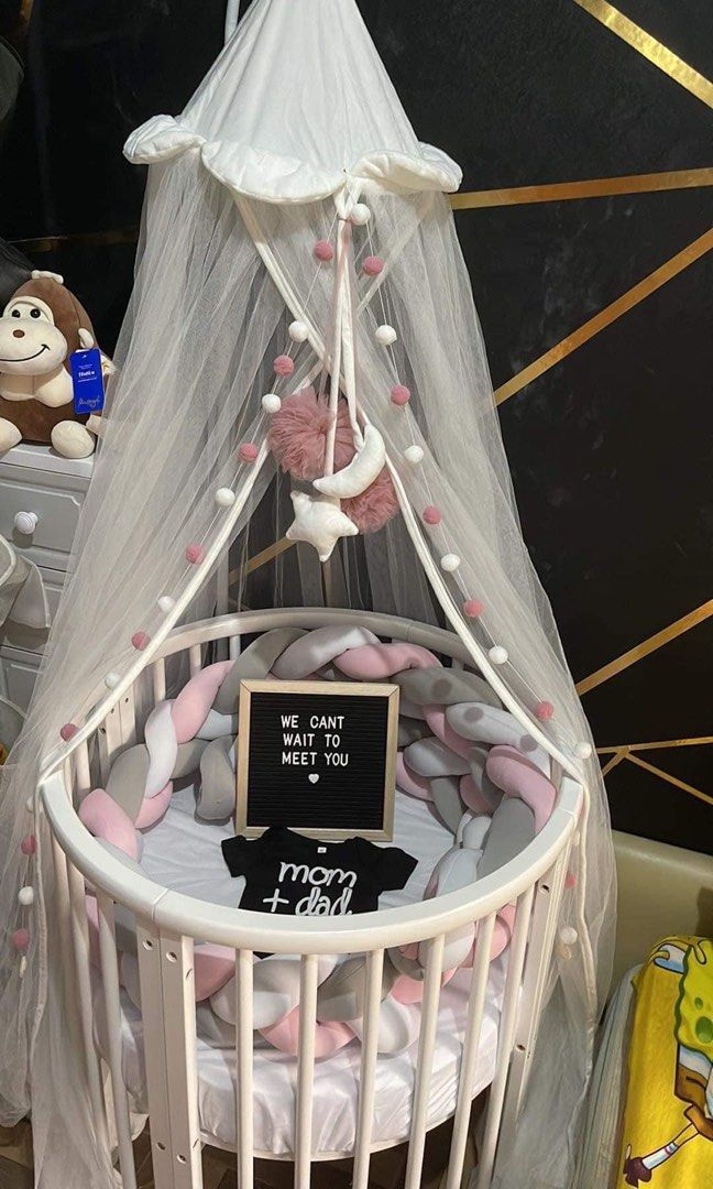 Crib 5in1 (Category: Cots & Cribs) located in Pasig City. Submitted by msjoyce612 (Listing ID 1269282092, Image 1). Description: Can turn into round crib w changing station for newborn baby Oval crib you lo become a little bit bigger Can connect sa bed Can turn into study table when your lo will be a toddler Included na ung foam Mosquito net Braided bumper Nursing pillow 2pcs Sobrang ganda po nito Di kau magsisisi Bought it for 25k di pa included