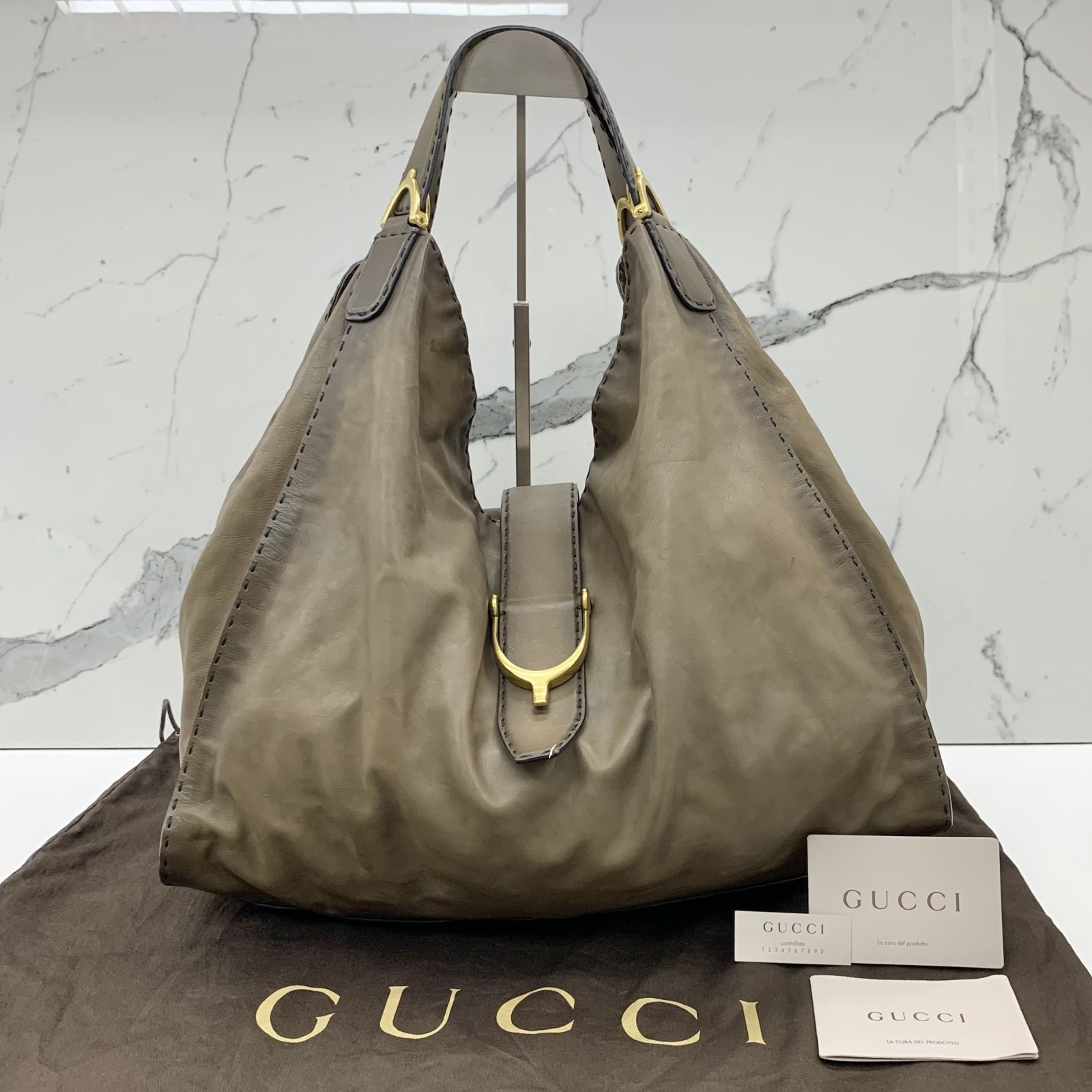 Soft stirrup light pink crocodile shoulder top bag gucci