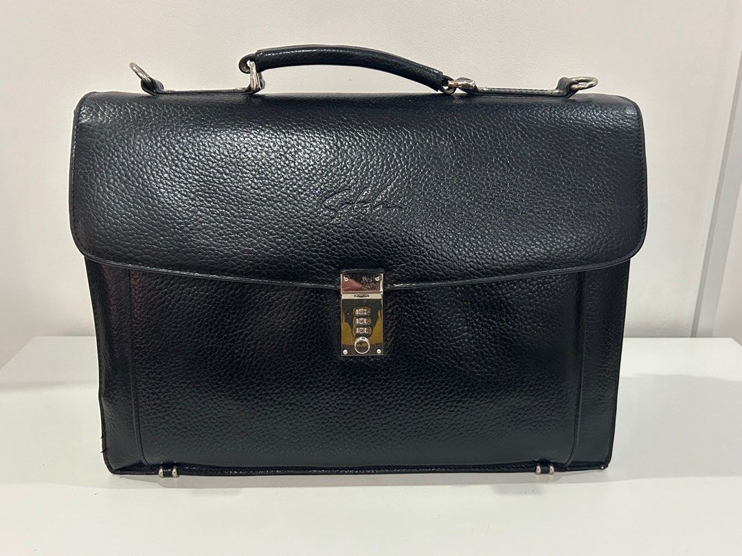 Leather Brief Case (Category: Luxury Bags & Wallets) located in Paranaque City. Submitted by cfcisco (Listing ID 1269122783, Image 1). Description: Leather Brief Case from Sachi of HongKong Black leather With Strap Approximately 16.5 H x 12W x 6W.