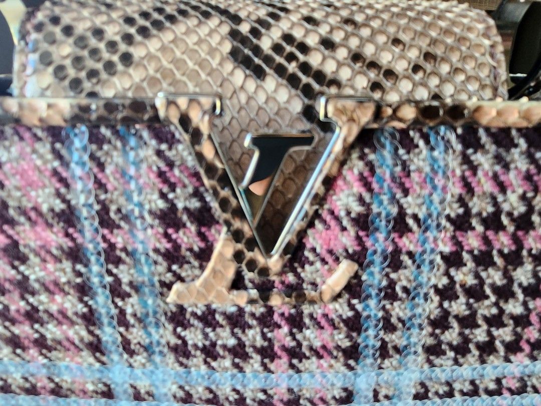 Lv Capucine (Category: Luxury Bags & Wallets) located in Quezon City. Submitted by nadine_miel (Listing ID 1269203531, Image 2). Description: Hi im selling my most favorite lv Capuccine a combination of tweed material ang phyton leather its a limited edition super prestine hindi ko msydo ginamit prng twice or thrice lang comes wth dust bag and box super good good deal rare ito mahirap hanapin.