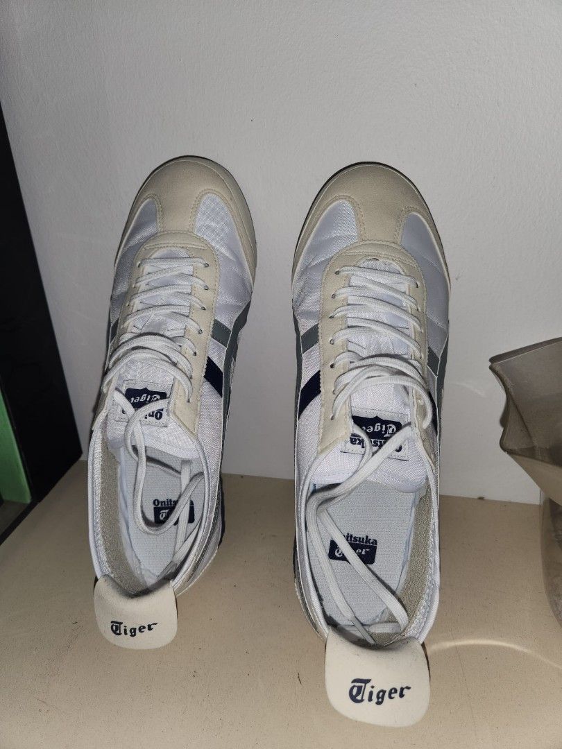 Onitsuka Tiger (Category: Sneakers) located in Singapore. Submitted by samzheng85 (Listing ID 1269110645, Image 2). Description: original Onitsuka Tiger. selling because bought wrong size too big for wife. euro size 40½. 25.5cm. comes with box and original reciept..