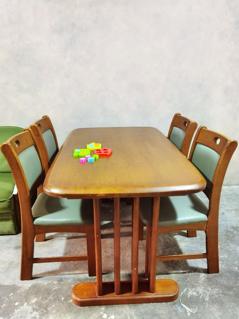 Solid Wood Dining Set - 4 seater (Category: Tables & Sets) located in Manila. Submitted by paperierome (Listing ID 1269271634, Image 2). Description: Solid Wood Dining Set 4 chairs - blue green soft foam leather upholstery. Fairly used with minor scratches but no major damage, you can resand and revarnish. Heavy | Made of premium solid hardwood. Buyer pick-up is highly recommended. RFS: will upgrade interior design. #smallhouse #furnitures #dinin