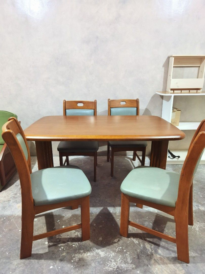 Solid Wood Dining Set - 4 seater (Category: Tables & Sets) located in Manila. Submitted by paperierome (Listing ID 1269271634, Image 1). Description: Solid Wood Dining Set 4 chairs - blue green soft foam leather upholstery. Fairly used with minor scratches but no major damage, you can resand and revarnish. Heavy | Made of premium solid hardwood. Buyer pick-up is highly recommended. RFS: will upgrade interior design. #smallhouse #furnitures #dinin