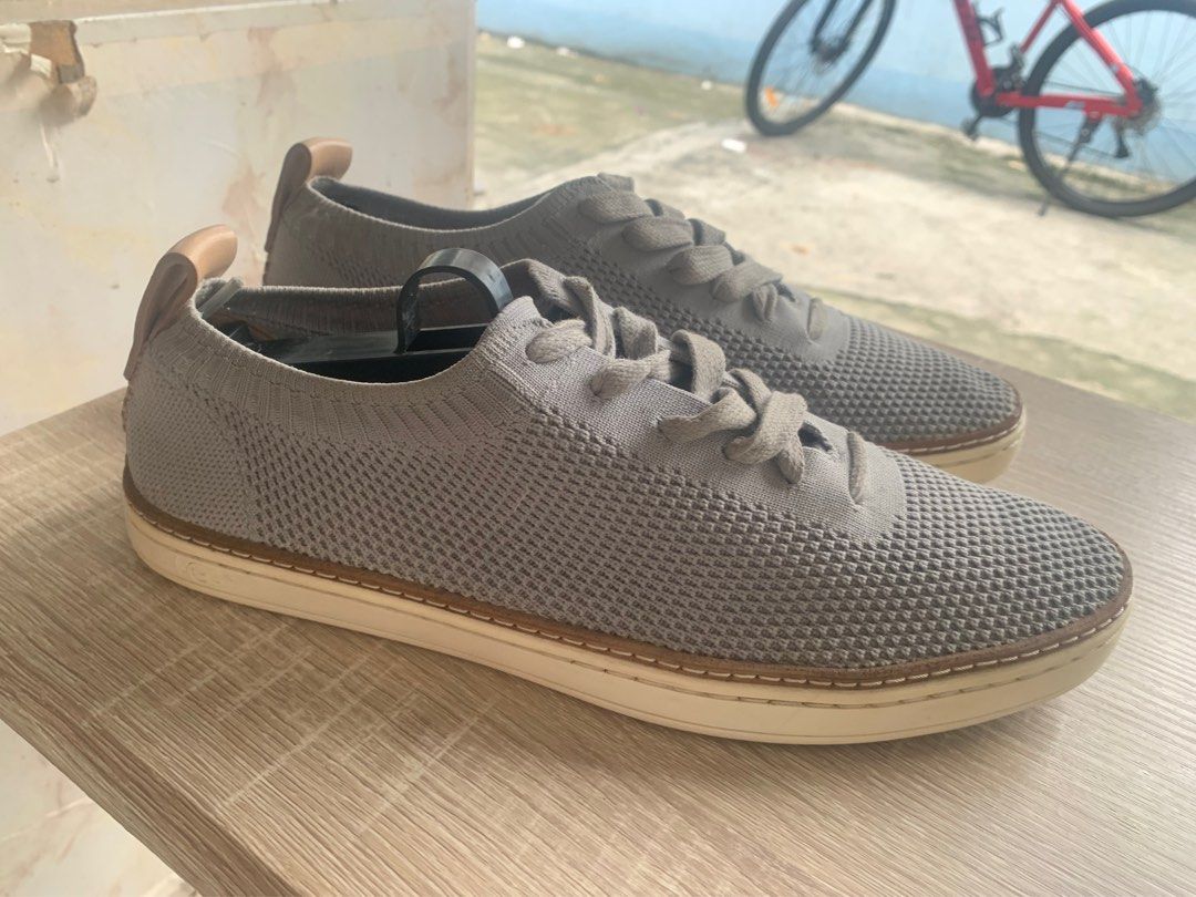 UGG Sydney Knit Leather Lace Up Sneaker (Category: Sneakers) located in Imus. Submitted by krabmeat (Listing ID 1269142497, Image 1). Description: No Original Box Details Model: 1095092 Light, fresh, and knit for movement, this sneaker blends a classic low-top silhouette with a weightless, breathable feel. Pair with culottes and a tee or a simple dress. Soft knit UGGpure™ heel lining Cushioning foam and PORON® insole Leather welt Rubber outsole.