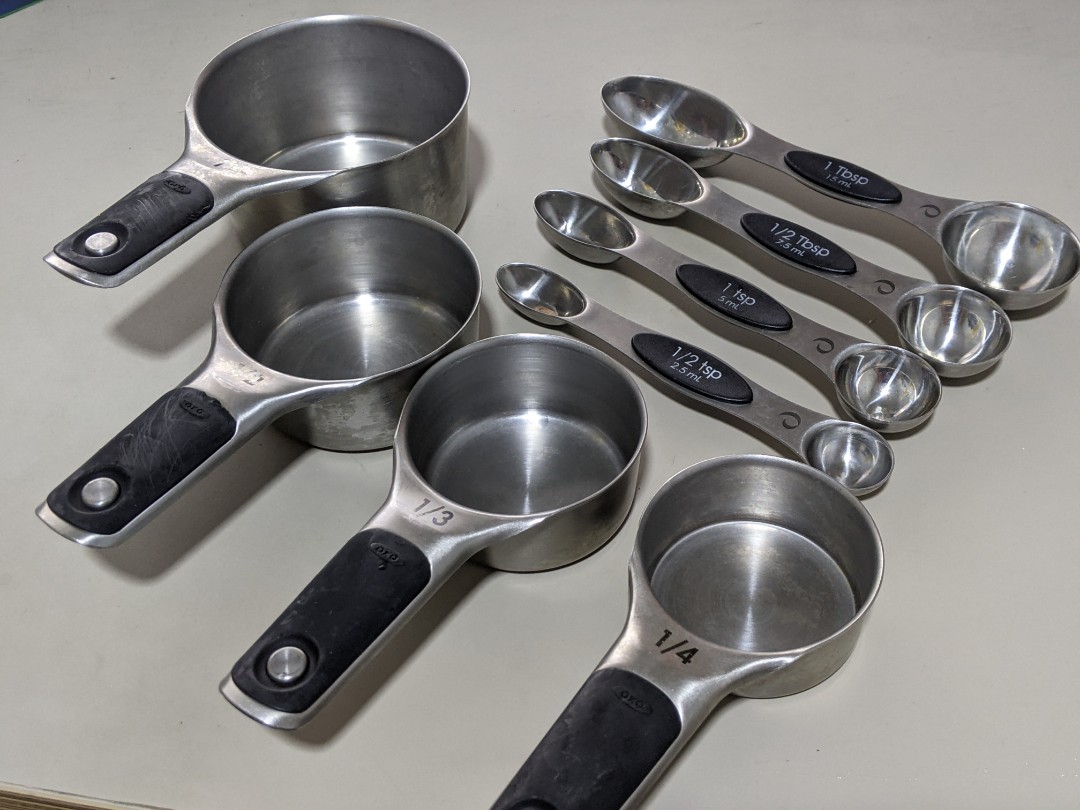 https://media.karousell.com/media/photos/products/2023/12/30/8_pcs_of_measuring_cupsspoons__1703944868_562bb3b2.jpg