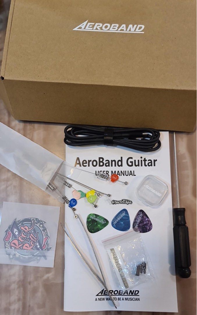 AeroBand Guitar Stringless Acoustic Electric Travel Guitar Portable Silent  New Technology Painpess Fingers Gitar Elektrik, Hobbies & Toys, Music &  Media, Musical Instruments on Carousell