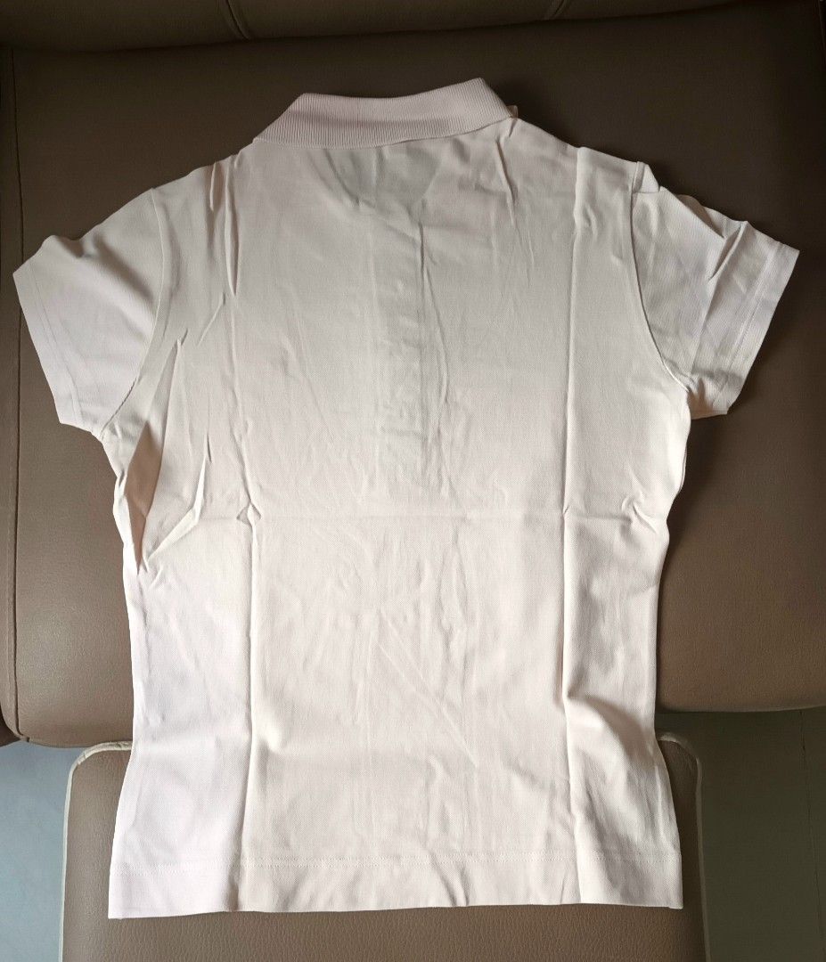 BURBERRY （分類：服裝）位於 Hong Kong。 由 alanlee7210 提交（商品編號 1275262421，圖片 3）。簡介： 粉紅色BURBERRY POLO 衫，在香港專門店購買，正牌正品貨，不是仿製品，如對該貨品存有疑問，請直接致電海關舉報(熱線:25456182 https://www.customs.gov.hk/tc/contact-us/report-information/index.html )，太太穿過2次後收埋，10年前產品，衣領等位置無變黃，size 如圖,圖片與出售之物品為同一件貨。。