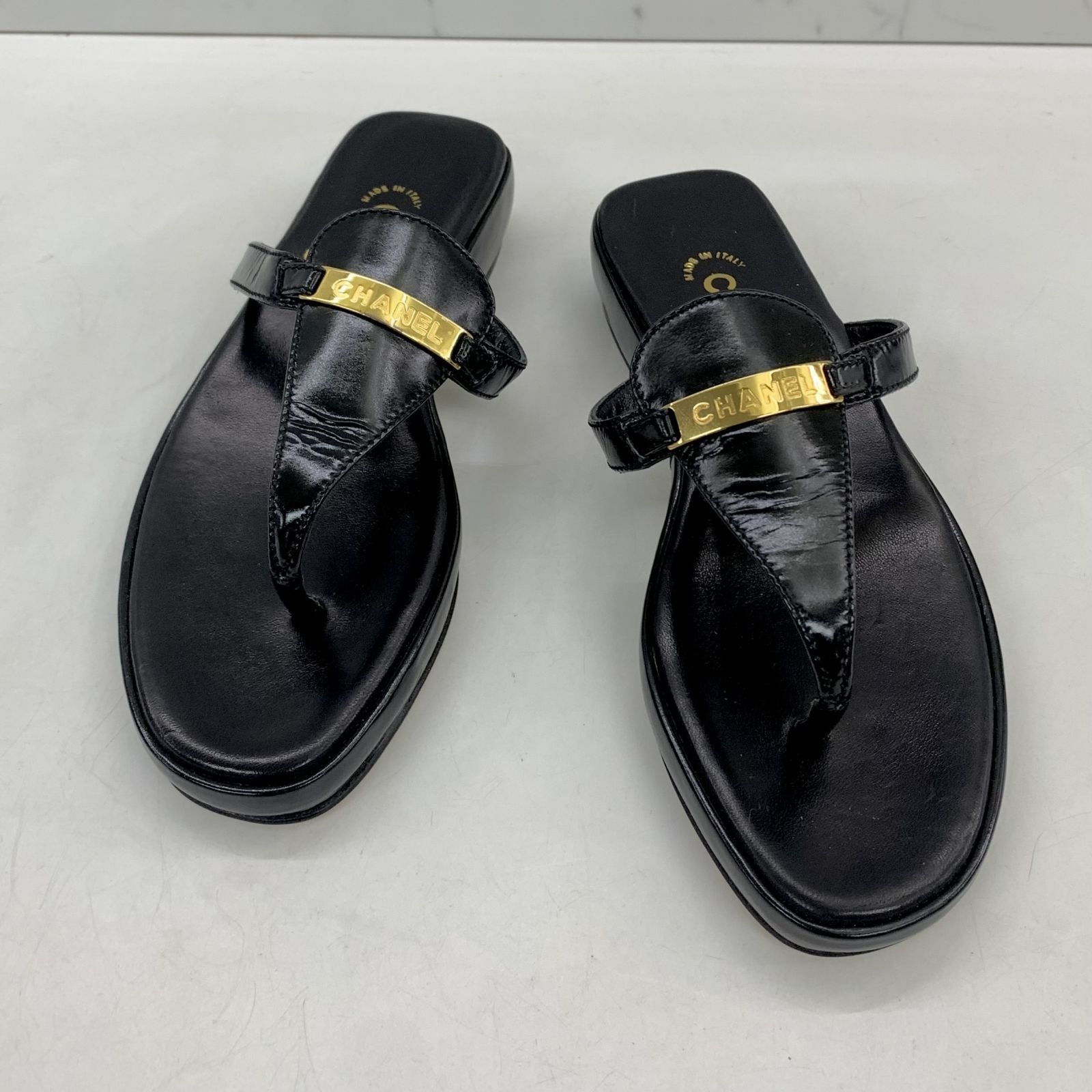 Black and gold deals chanel sandals