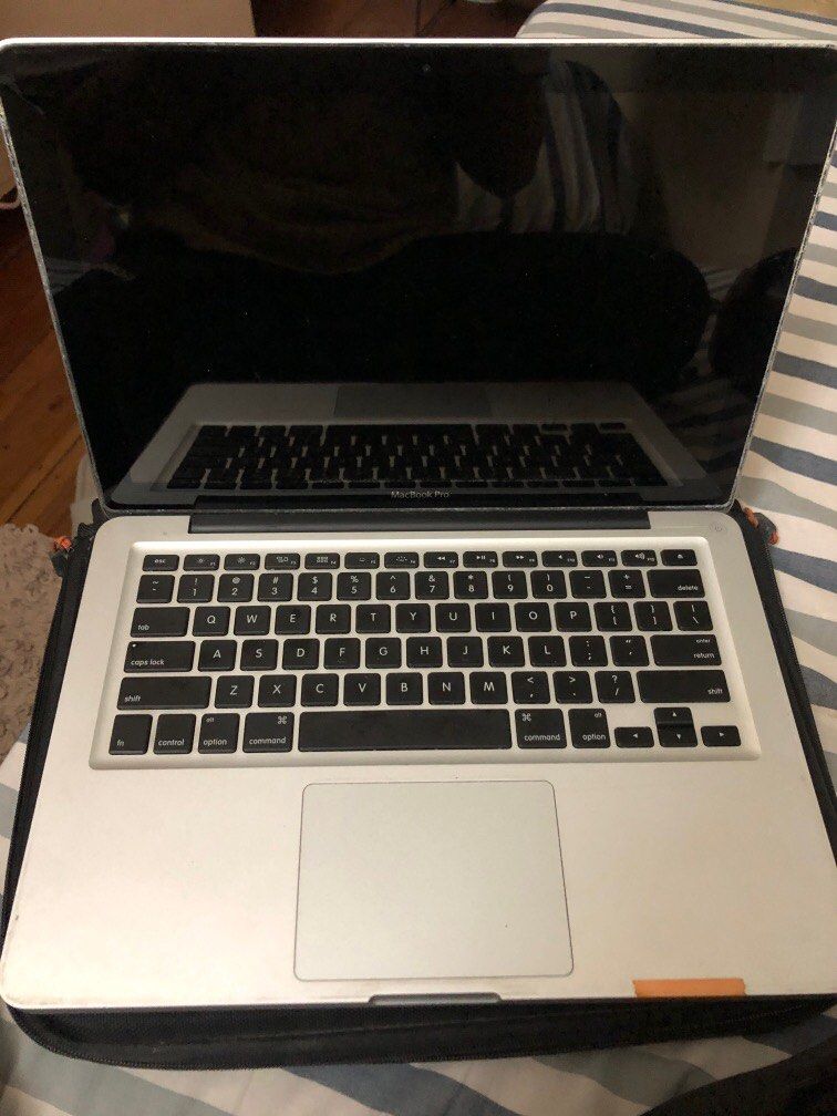 DEFECTIVE MACBOOK PRO | For parts only (Category: Laptops & Notebooks) located in Baguio. Submitted by lcreole.maria (Listing ID 1275299066, Image 1). Description: I am the first and last owner. This has some water damage. PM if you want a closer look at the item. Was always in its casing so it’s 95% smooth. .
