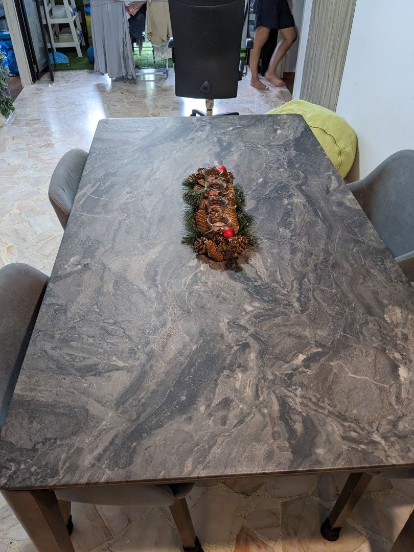 Dining Table set (Category: Tables & Sets) located in Singapore. Submitted by rvj1007 (Listing ID 1275287684, Image 2). Description: Dining Table + 4 chairs. Bought 2 years ago for $1000, selling due to move overseas. Buyer need to arrange transportation (price is not negotiable).