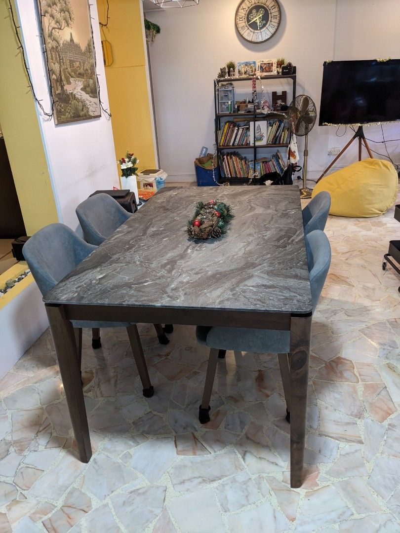 Dining Table set (Category: Tables & Sets) located in Singapore. Submitted by rvj1007 (Listing ID 1275287684, Image 1). Description: Dining Table + 4 chairs. Bought 2 years ago for $1000, selling due to move overseas. Buyer need to arrange transportation (price is not negotiable).