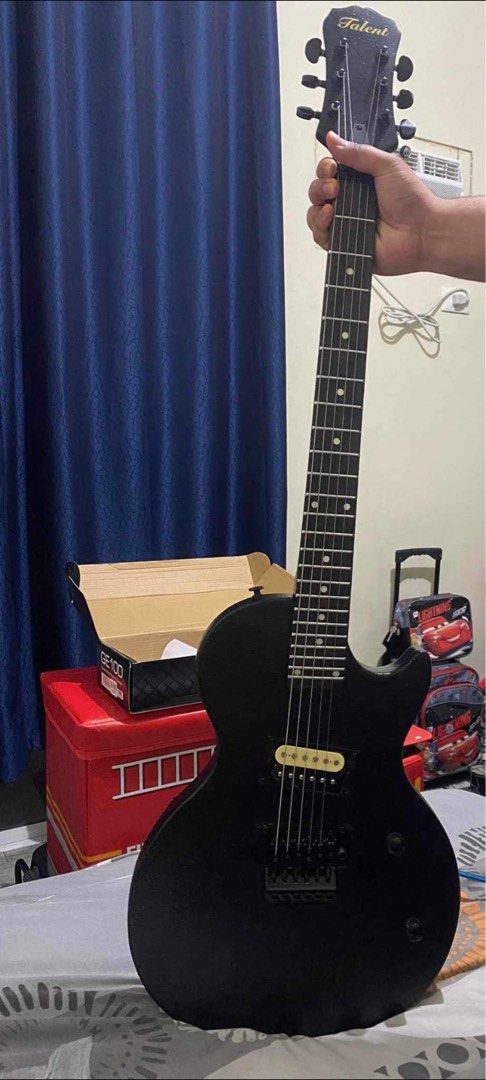 Les Paul electric guitar (Category: Musical Instruments) located in Binan City. Submitted by chanelzoleta03 (Listing ID 1275330405, Image 2). Description: For Sale Electric Guitar Les paul- Talent by Gibson, newly set up with new strings. (Elixir brand) Napatid lang yung no. 1 string. Bought last year almost new Thank you!.