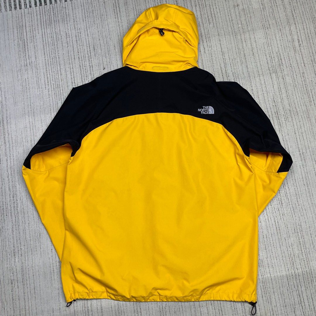 The north face yellow windbreaker deals