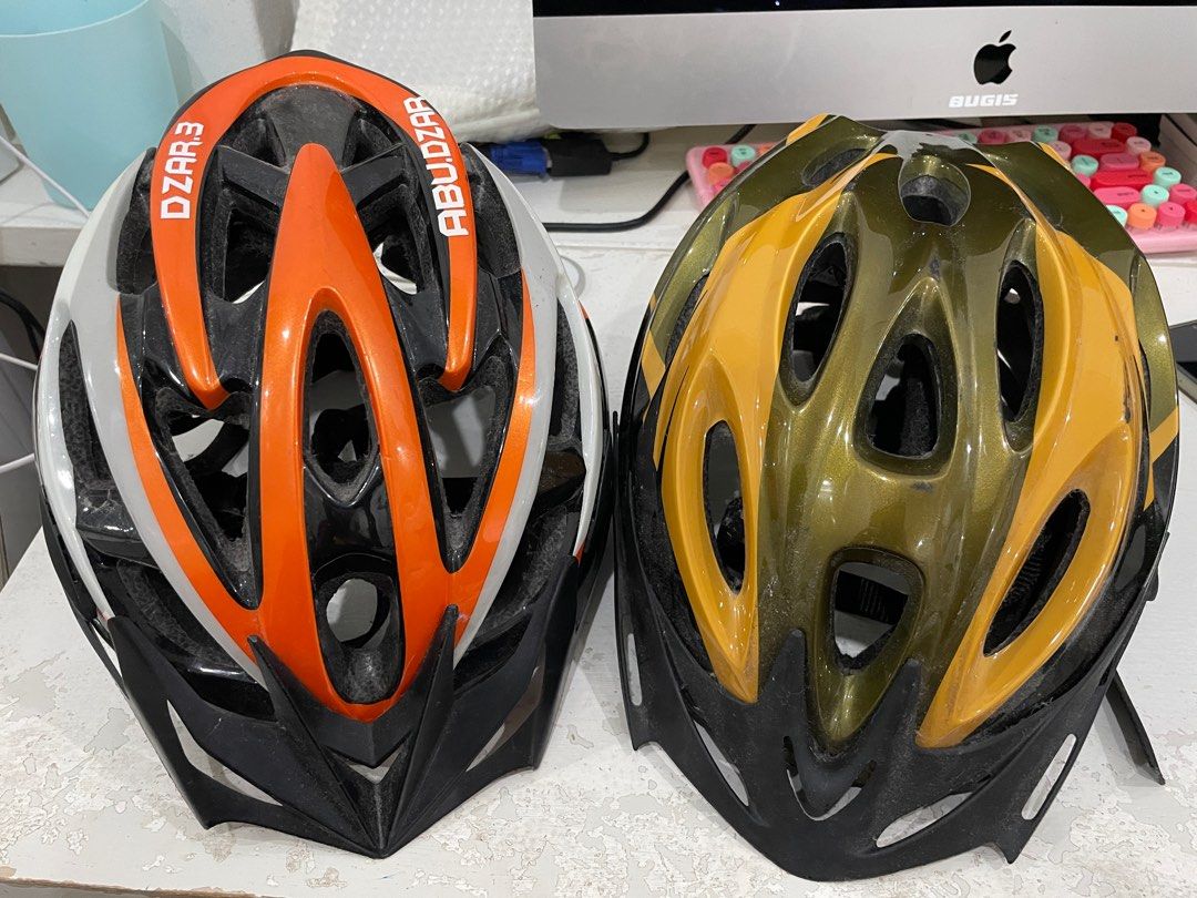 A pair of used helmets Sports Equipment Bicycles Parts Parts